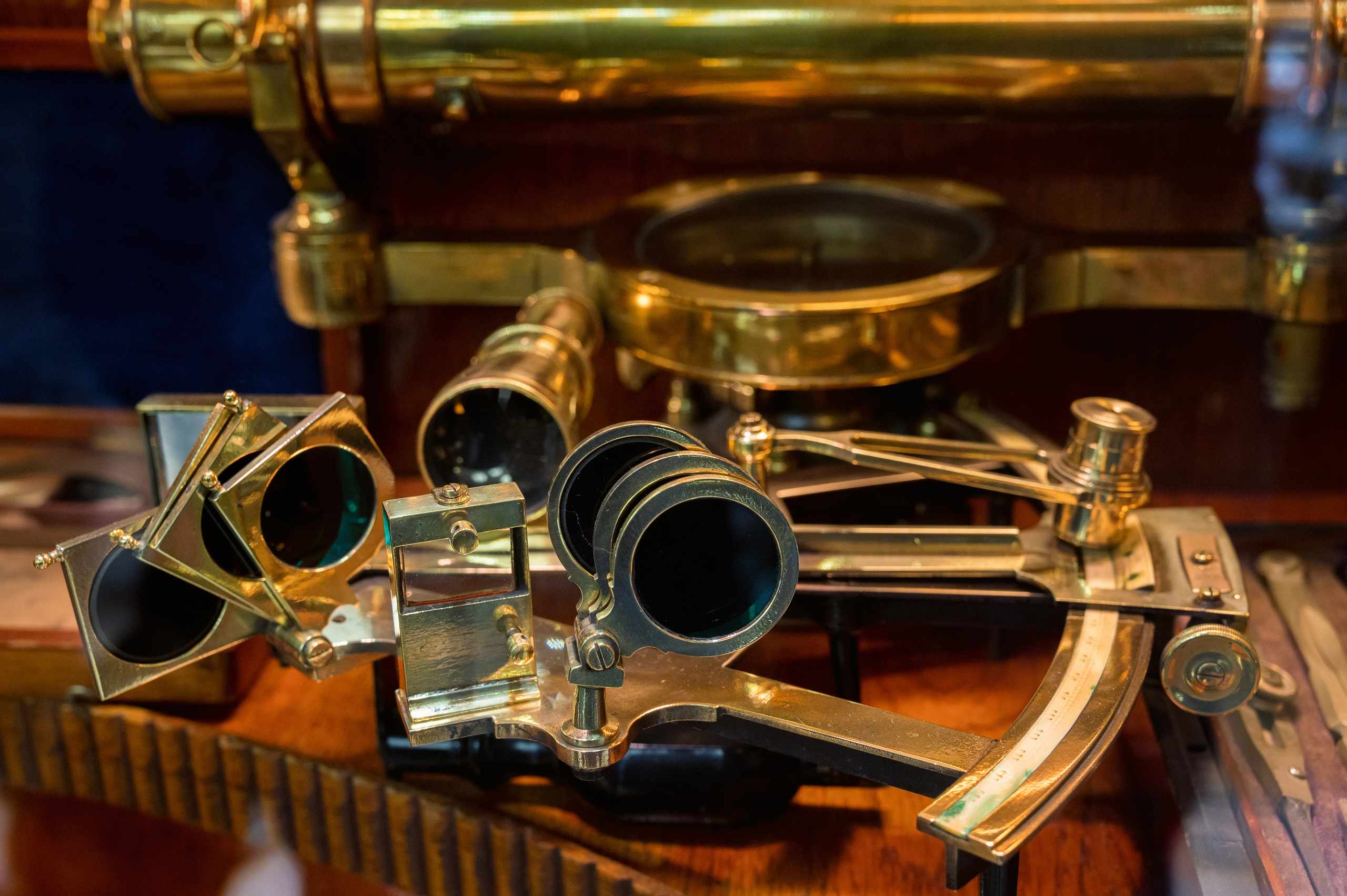 Close-up of an old bronze sextant in an exhibit